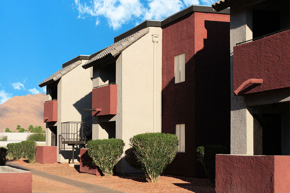 This image displays exterior photo of Las Palomas Apartments