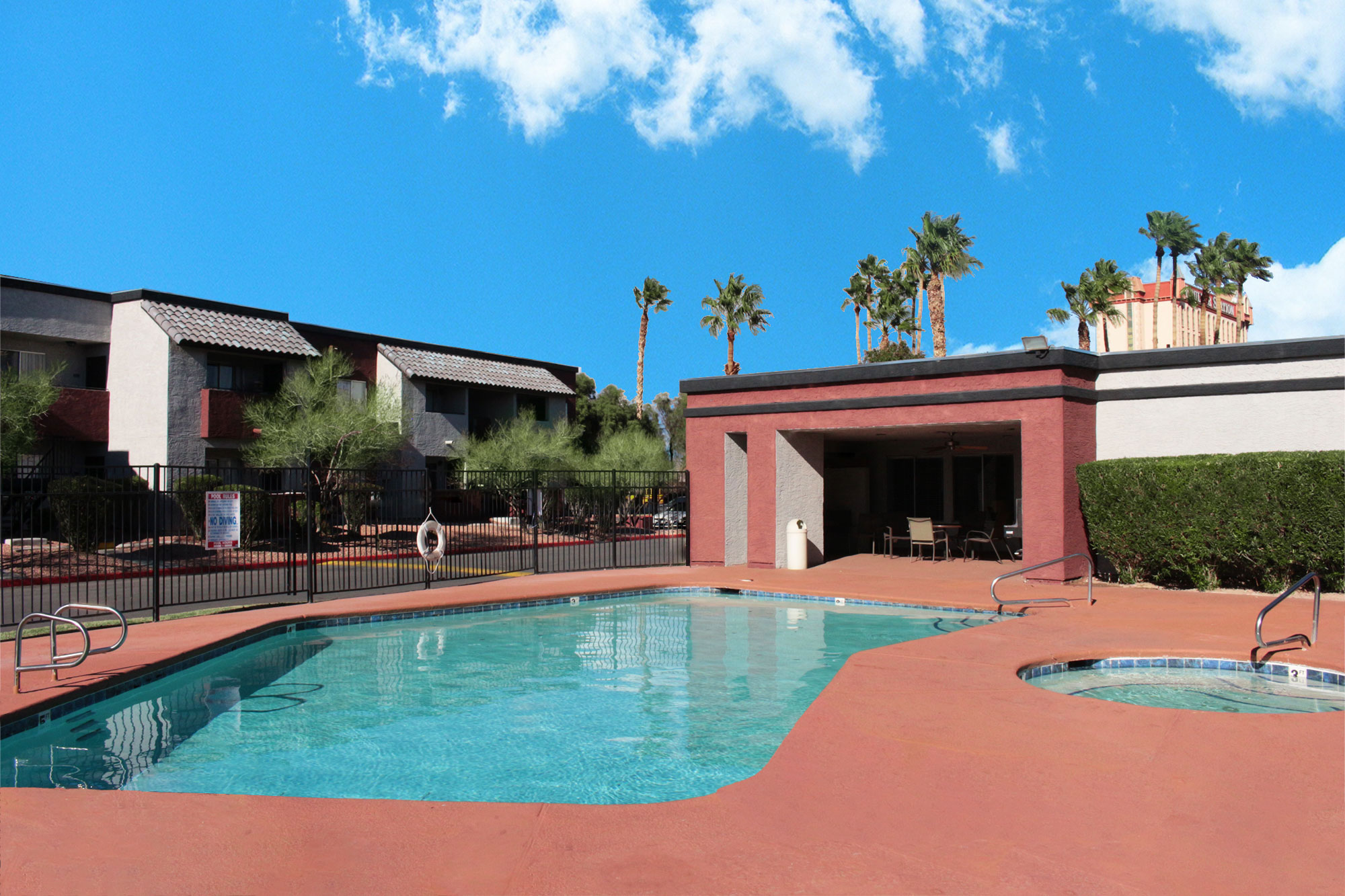 This image displays swimming pool photo of Las Palomas Apartments